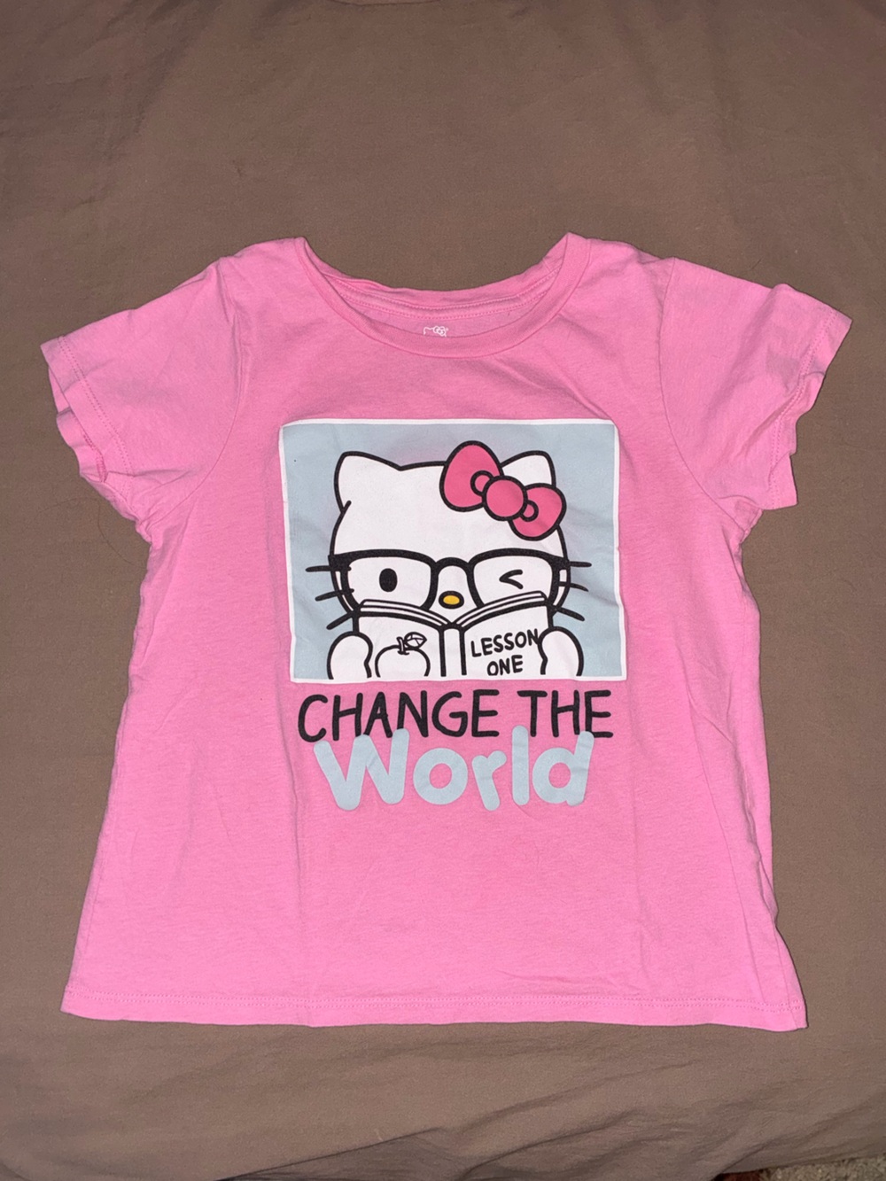 Hello Kitty Pink Graphic Tee with 'Change the World' Design
